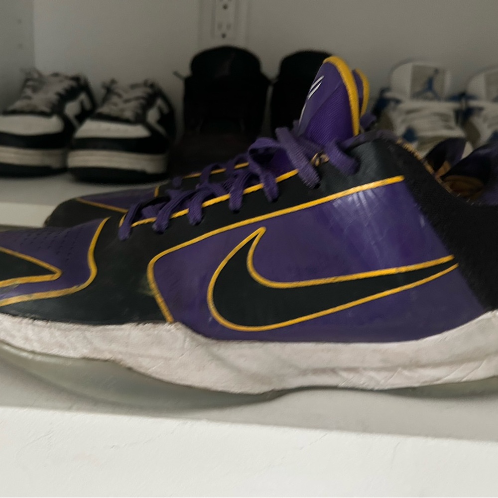 Nike Purple and Black Athletic Shoes with Sleek Design